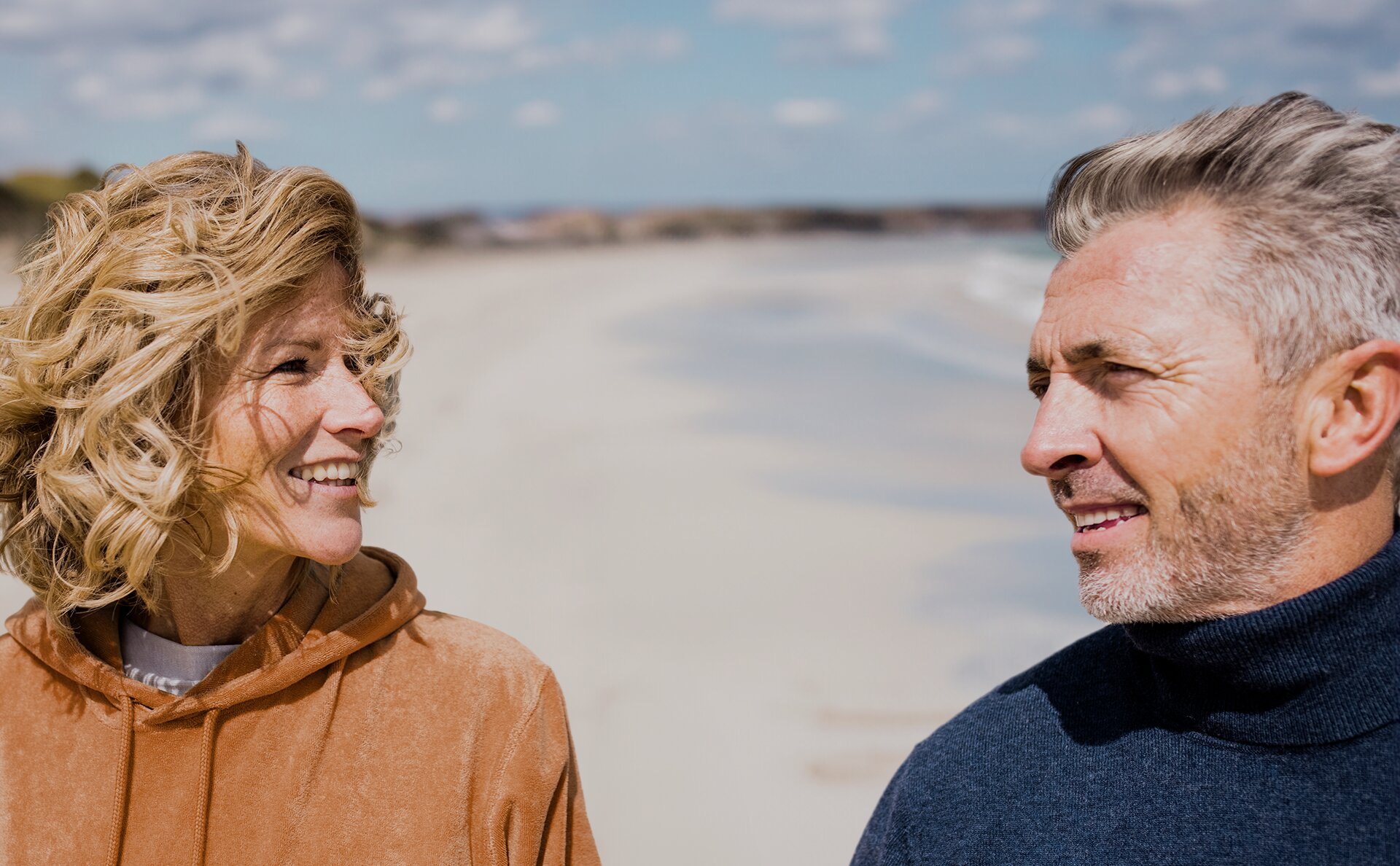 Senior couple smiling together outdoors